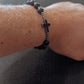 Perlenarmband Kreuz